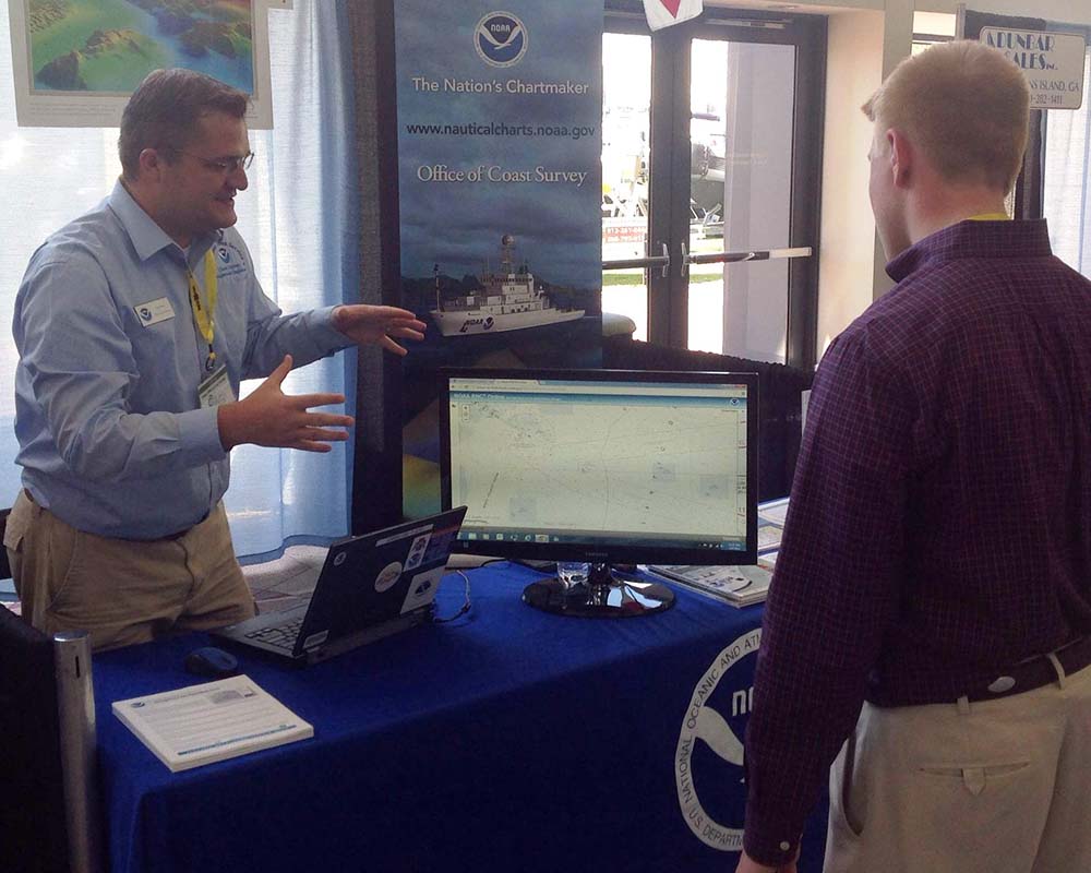 NOAA Navigation Manager providing customer service to maritime community.