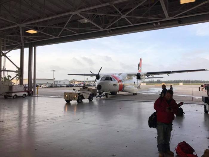 MIST team prepares to depart Mobile, AL, on the U.S. Coast Guard HC-144.