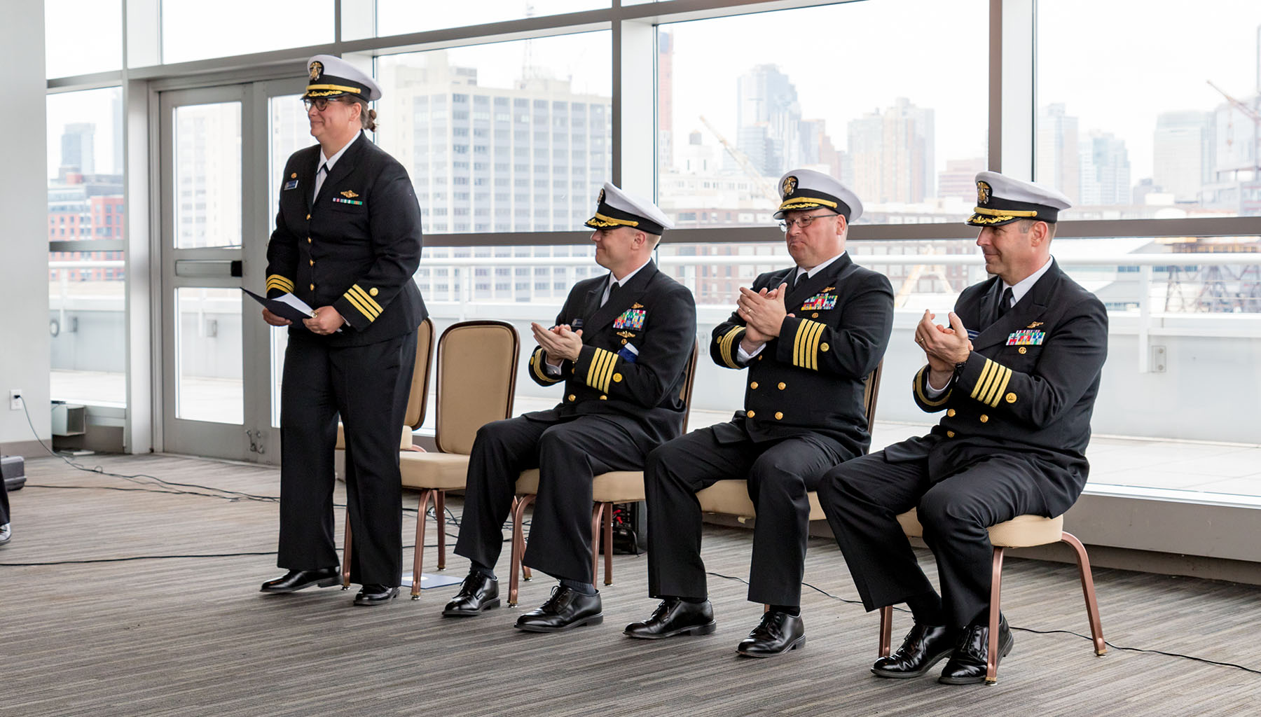 Cmdr. Briana Welton Hillstrom, Capt. Chris van Westendorp, Capt. David Zezula, Capt. Rick Brennan.