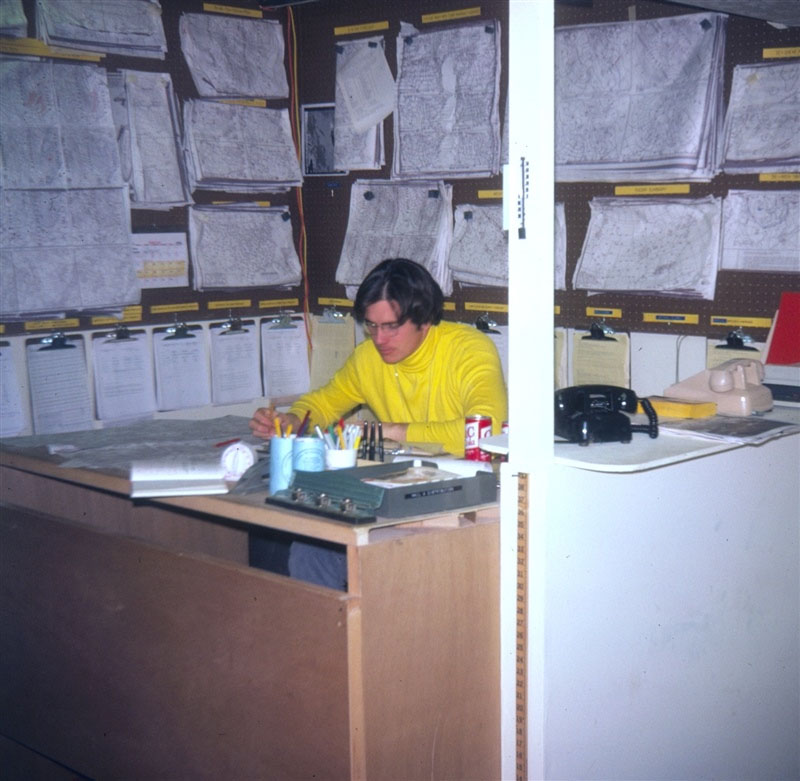 Meteorologist Doc Taylor in the NWS Olympic Support Unit Forecast Office in Lake Placid preparing the forecast.
